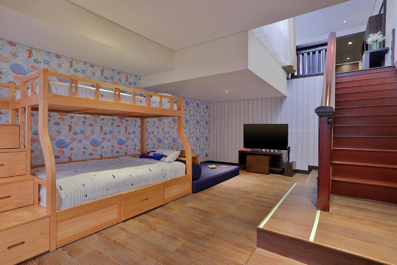 Anantara The Palm Dubai Resort Esterno foto A bunk bed in a hotel room